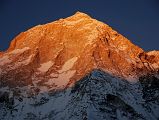 
The last rays of sunset burn Makalu West Face, Makalu West Pillar, and Makalu Southwest Face from East Col Glacier Camp (5800m).
